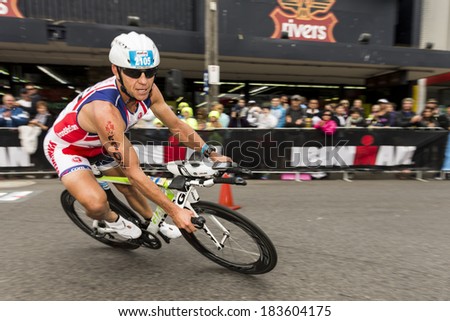 MELBOURNE, VICTORIA, AUSTRALIA - MARCH 23, 2014 - Kevin Fergusson of Australia during the 180km Ironman bike leg on March 23, 2014.
