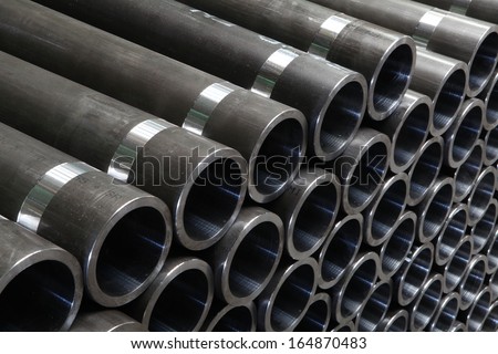 steel pipes on black and white