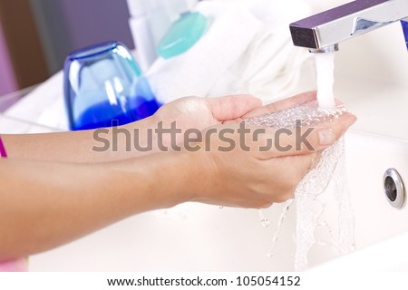 Hand hygiene, female hand washing tap water for cleanness