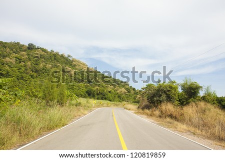 mountain road, yellow line on highway street curve along mountain