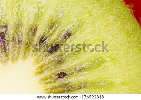 kiwi, close up surface of kiwi fruit showing black seeds