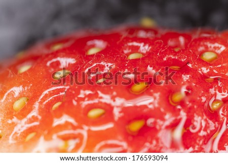 strawberry texture, close up of red shiny strawberry showing texture