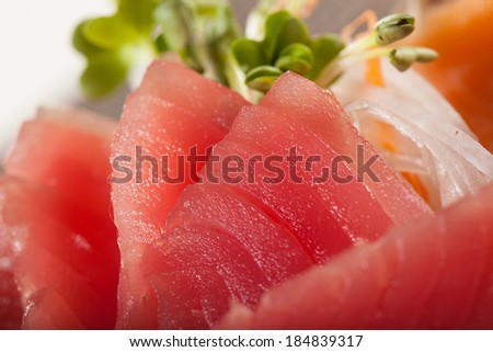 tuna sashimi, raw Tuna fish in traditional Japanese style eat with slice daikon radish