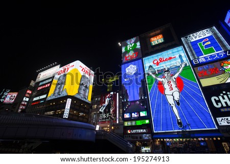 OSAKA, JAPAN - MAY 16: Glico Man light billboard and other light displays on May 16, 2014 in Dontonbori, Namba Osaka area, Osaka, Japan. Namba is well known as an entertainment area in Osaka.