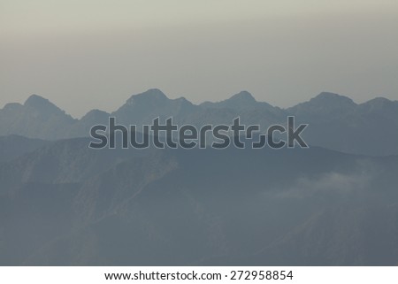 sharp mountain, outdoor view of sharp mountain peak from the top with cloudy sky