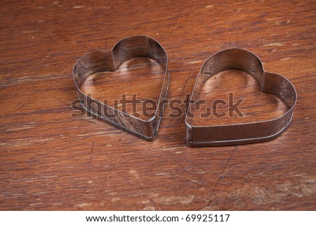 Two hearts, Two silver heart shape put together.
