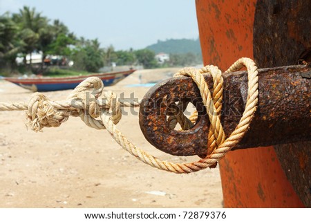 Tied up, A big rope tied up with rusty pontoon.