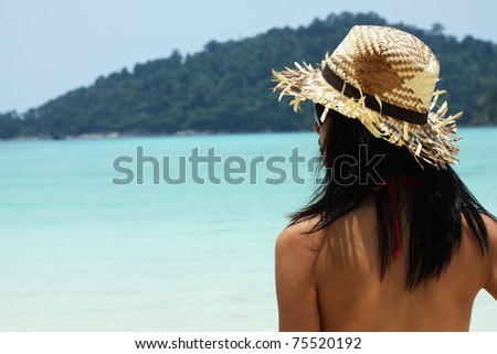 Vacation, A girl standing by the sea ready for her vacation.