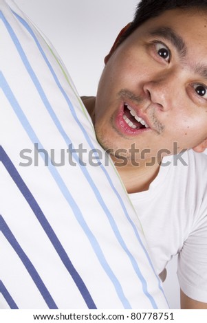 Male Calendar Poses on Stock Photo Funny With Bolster Male Model Pose Funny Squint Eyes With