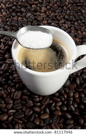 sugar add, espresso coffee and a spoon of sugar add.