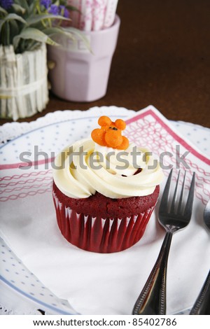 dessert cup, a dessert cup cake serving with fork and spoon.