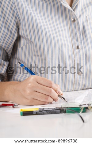 making note, secretary write a note for boss.