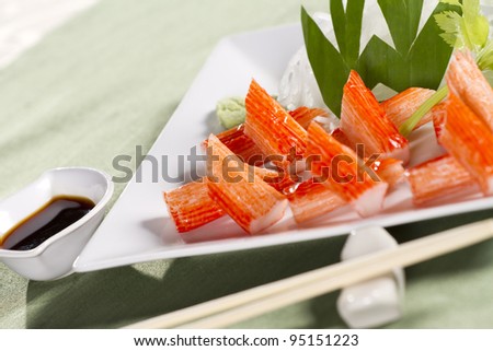 crab stick set, decorate crab stick in white plate Japanese food.