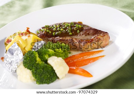 sirloin steak, sirloin steak with brown pepper sauce and baked potato