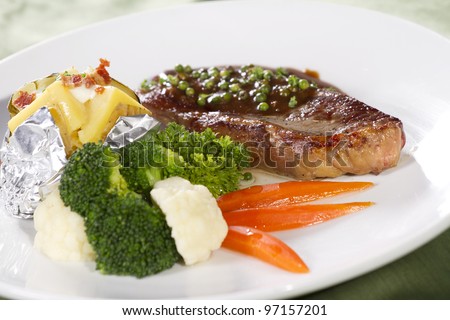 sirloin, sirloin steak with brown pepper sauce and baked potato