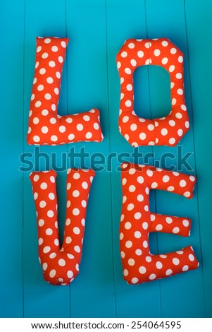The letters with red polka dot fabric \
