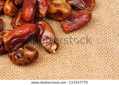 dried dates on canvas background