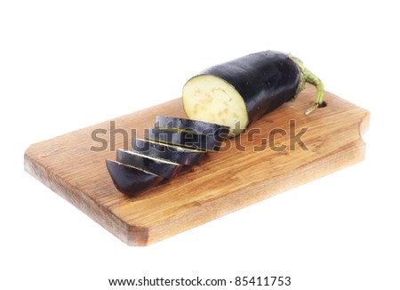 sliced eggplant on a cutting board  isolation on white