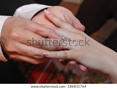 engagement ring, bride and groom hands close up ring