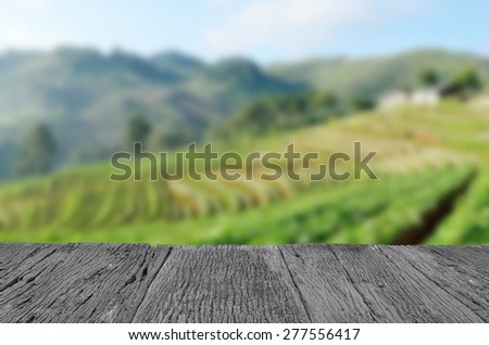 Defocus and blur image of old wood and Beautiful landscape and fresh strawberries farm at Chiangmai ,Thailand for background usage