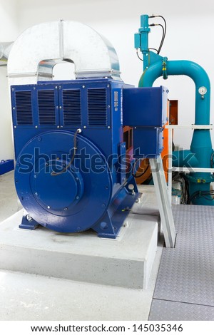 Electric generator in a small hydro power plant.