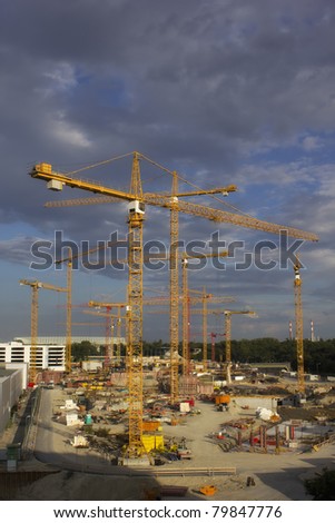 Construction site with multiple cranes