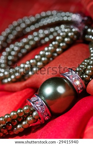 Jewelry on a red scarf