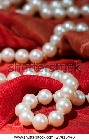 Jewelry on a red scarf