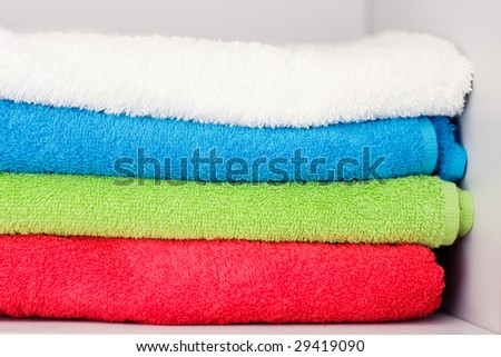 Colorful towels in the closet