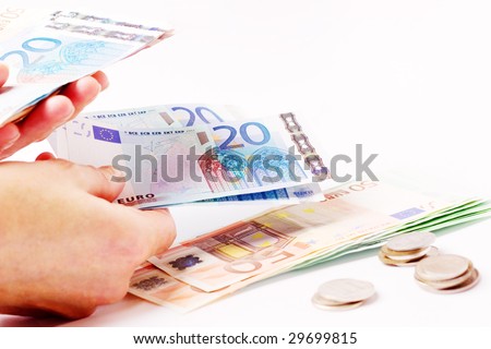 Woman counting and giving money - money papers and coins