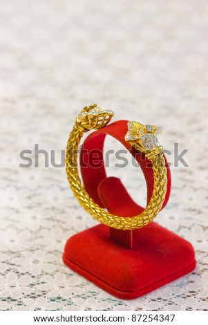 golden bangle with jewel pattern
