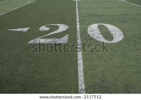 20 yard line of a football field where all the action happens.