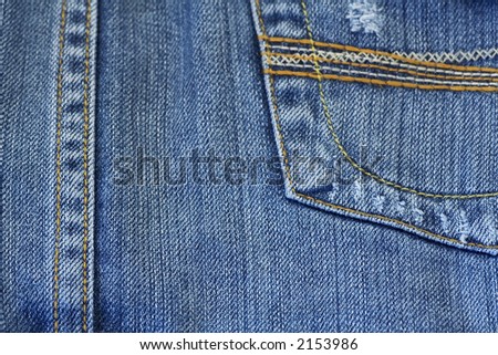 up close of the pocket of a jean skirt.