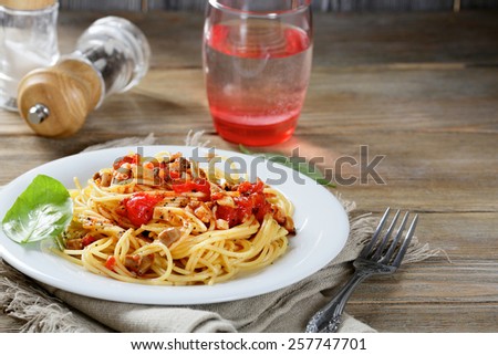 Pasta on the plate in wooden table. Traditional italian food