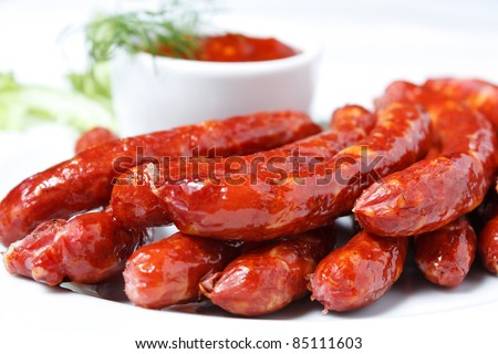 Hunting sausages. Fatty and unhealthy foods. ?holesterol products