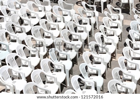 Rows of chairs for outdoor dehors alfresco bar and live gig conc