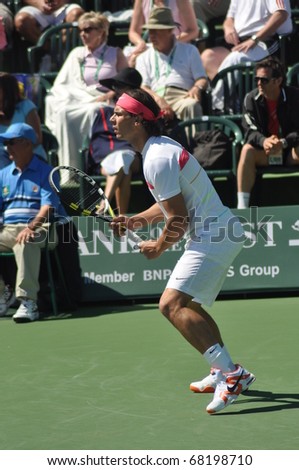 INDIAN WELLS, CALIFORNIA - MARCH 14.  Spain\'s Rafael Nadal prepares to receive serve during an early round doubles match March 14, 2010 at the BNP Paribas Open