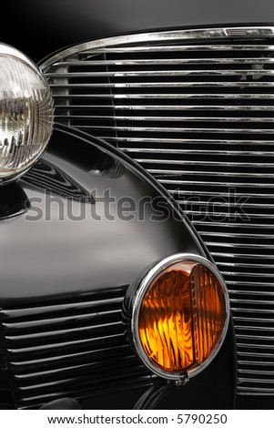 stock photo The chrome grill and headlights of an antique classic car