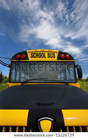 Wide angle front view of a school bus.