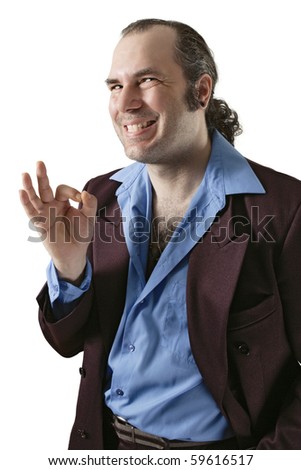 stock photo : A sleazy car salesman, Con man, or pimp, wearing a
