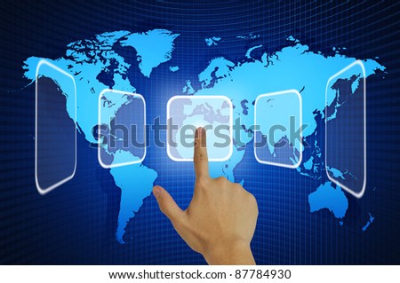 Hand pressing touchscreen button on the world map background