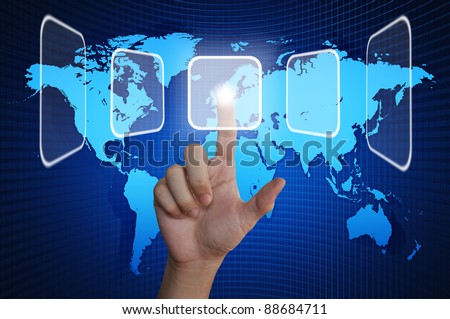Hand pressing touchscreen button on the world background