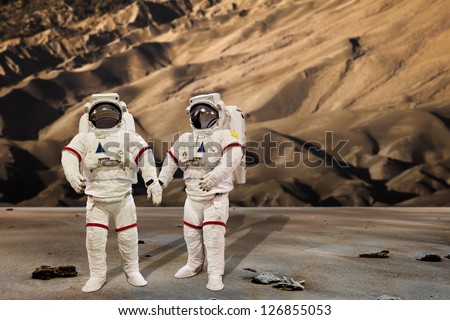Astronaut Wearing Pressure Suit in a sand dune Background