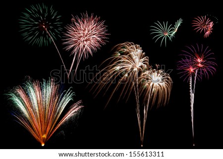 Fireworks of different colors and shapes isolated on black background