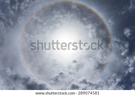 sun halo, sun with circular rainbow in the sky on Summer Solstice Day