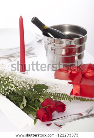 Romantic table setting with rose  and cutlery