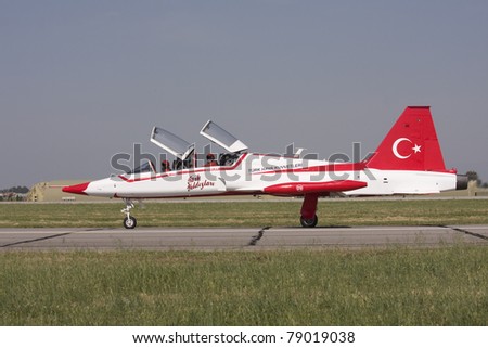 IZMIR,TURKEY – JUNE 06 :turkish demonstration team ´´ turkish stars´´  jet takes off at ´´Airshow Turkey´´ on june 06 2011 in izmir, Turkey,
