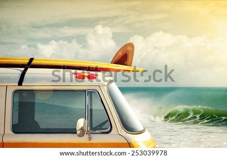 Idyllic surfing way of life with a van and long board near the sea