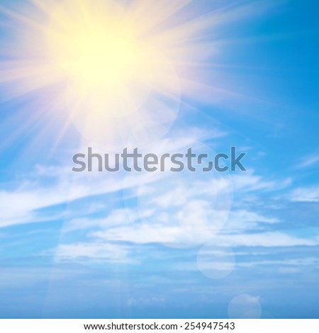 Heavenly blue sky with bright sunshine and light beams