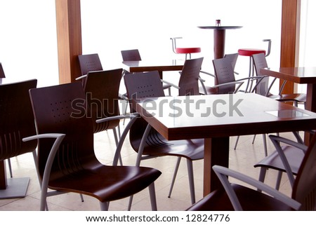 Modern Coffee Shops on Empty Tables In A Closed Modern Coffee Shop Stock Photo 12824776